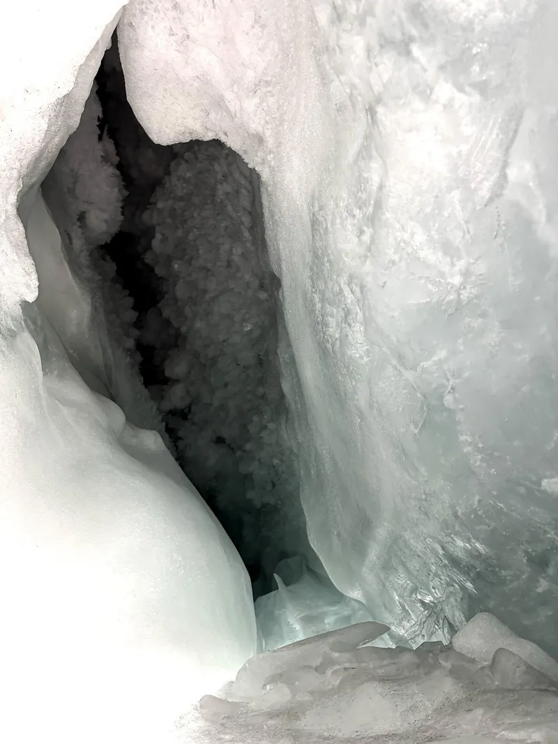 Hikers standing on a glacier summit near 4,000m on a guided Zermatt glacier tour, Switzerland
